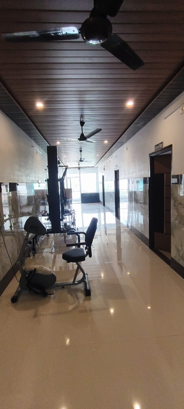Physiotherapy corridor and equipment at Dr. Naidu Hospital