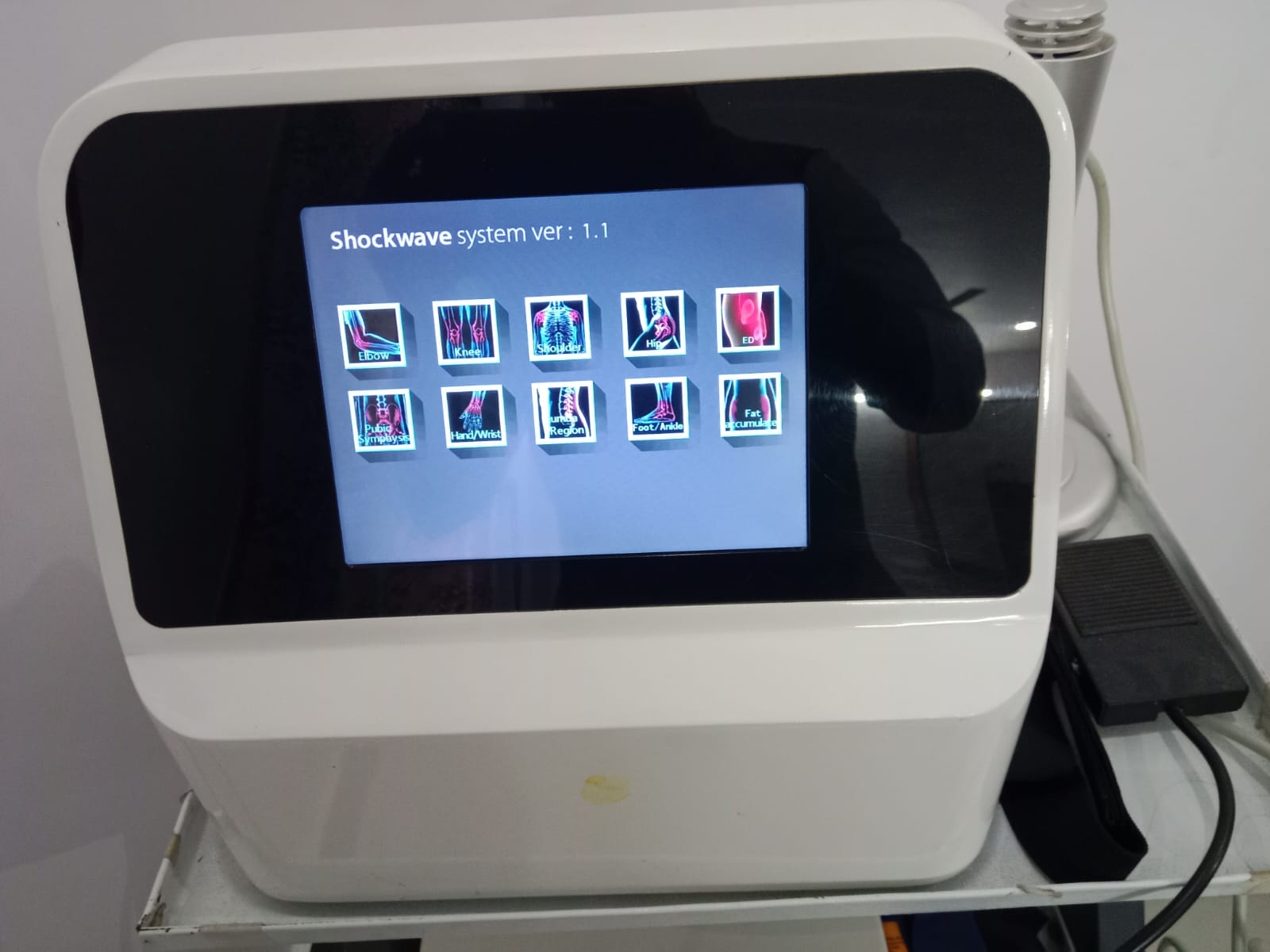 Shockwave therapy machine display at Dr. Naidu Hospital Yeleswaram